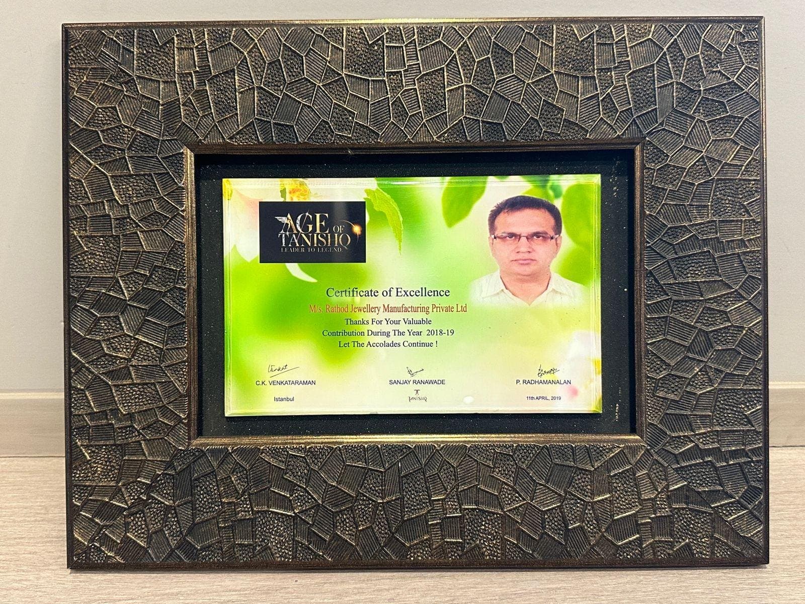 The framed Tanishq certificate of excellence